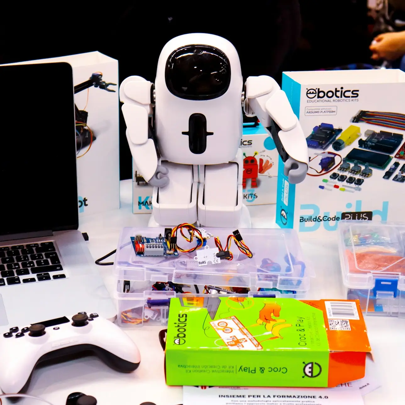 white electronic robot toy